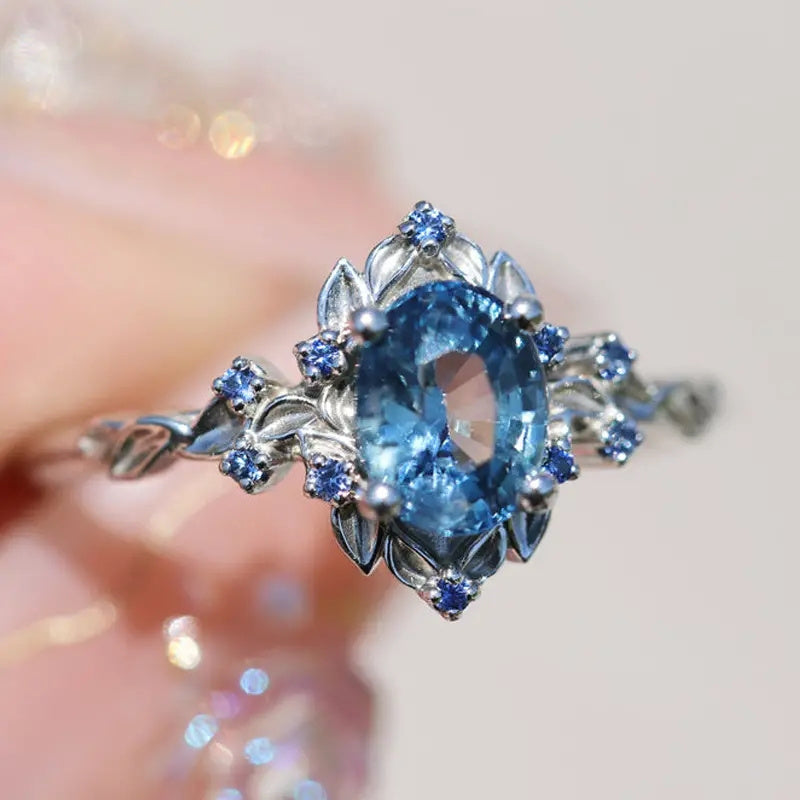 Custom Oval-Cut Blue Gemstone Vintage Floral Ring