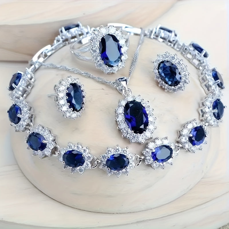 Custom Blue Sapphire Halo Jewelry Set: Necklace, Earrings, Ring & Bracelet