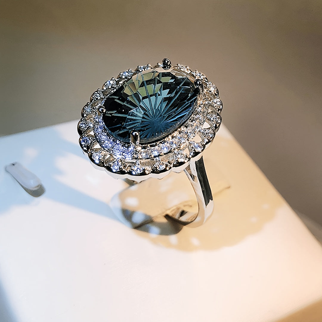 Custom London Blue Oval Starburst Cut Vintage Halo Ring