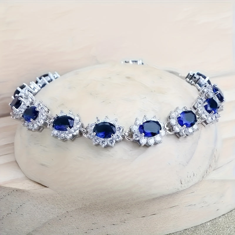 Custom Blue Sapphire Halo Jewelry Set: Necklace, Earrings, Ring & Bracelet