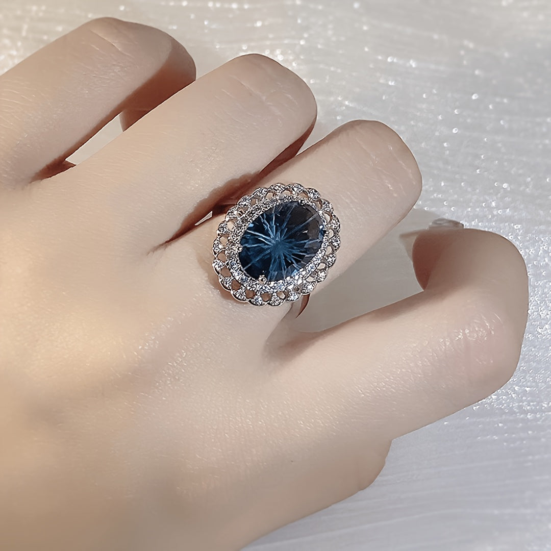 Custom London Blue Oval Starburst Cut Vintage Halo Ring