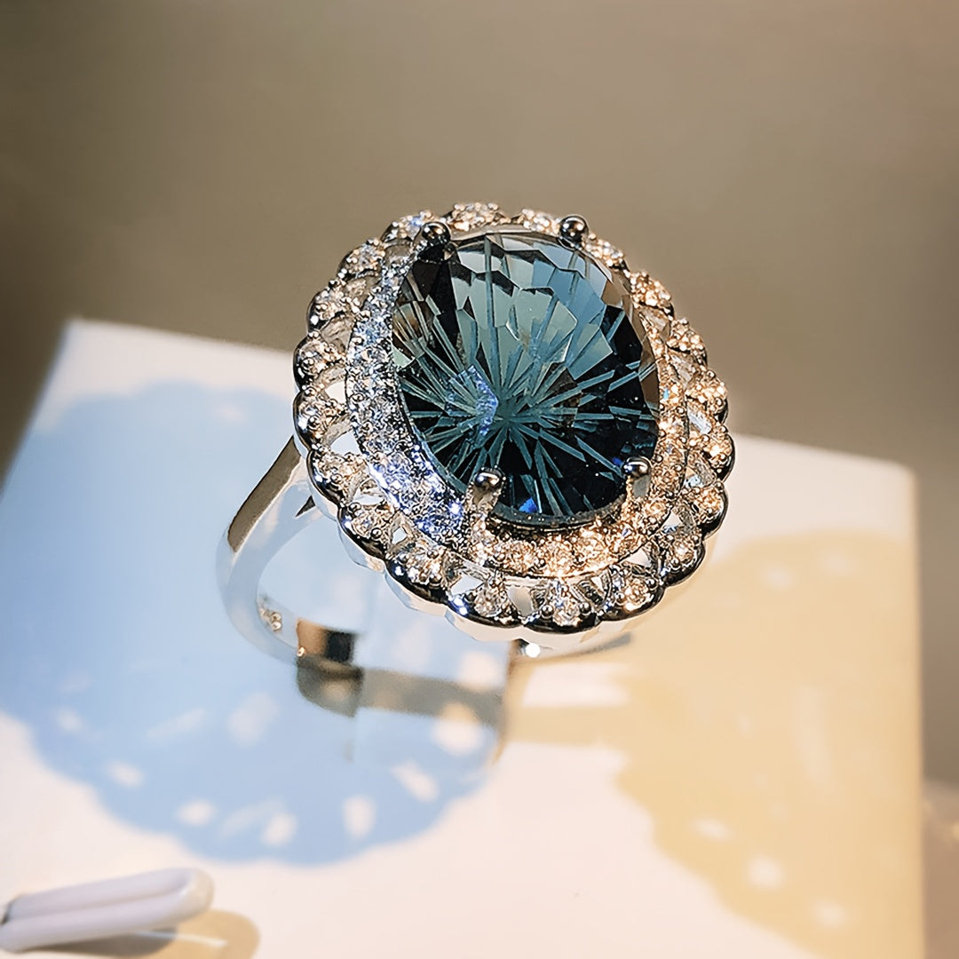 Custom London Blue Oval Starburst Cut Vintage Halo Ring
