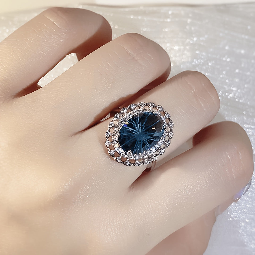 Custom London Blue Oval Starburst Cut Vintage Halo Ring